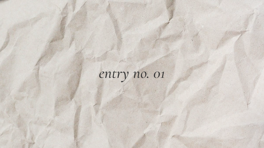 soft paper background with ‘entry no. 01’ written in script